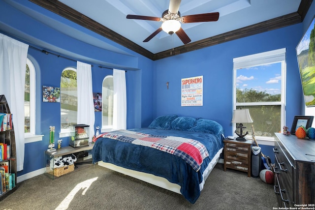 carpeted bedroom with ceiling fan and crown molding