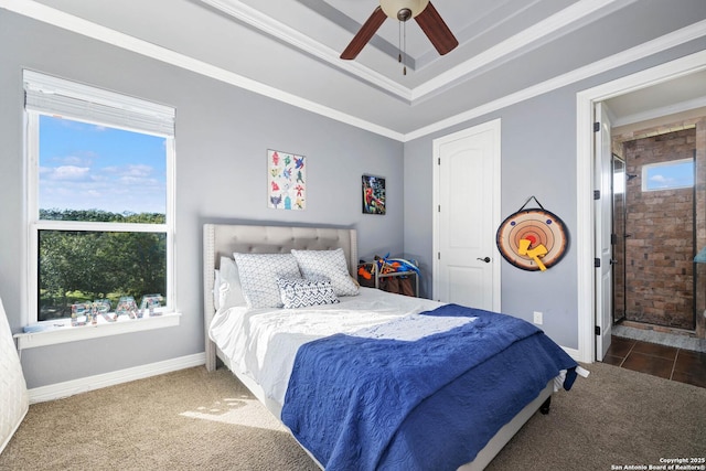 carpeted bedroom with ceiling fan and crown molding