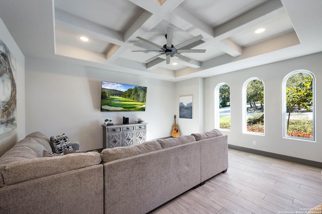 living room featuring ceiling fan and light wood-type flooring