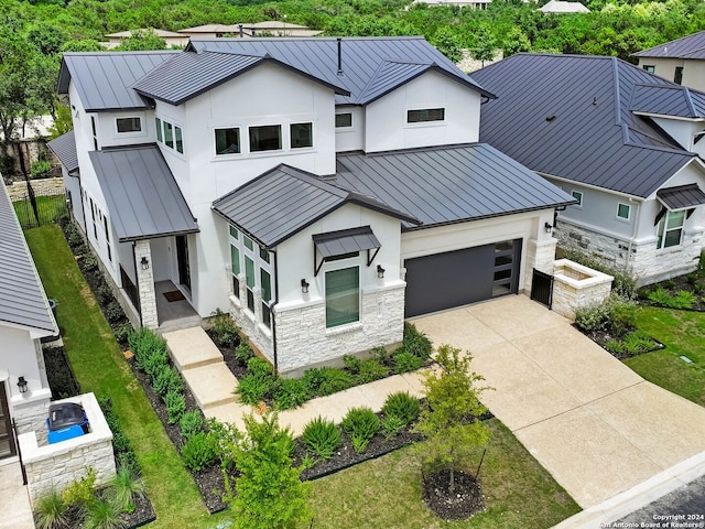 modern farmhouse style home featuring a garage