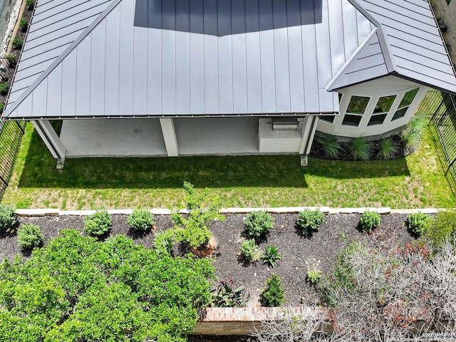 view of home's exterior featuring a lawn