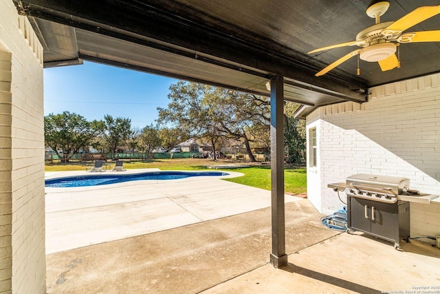 view of patio / terrace with ceiling fan and area for grilling