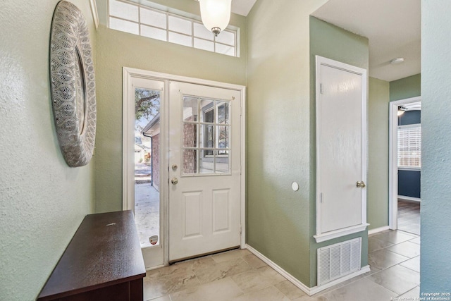 entrance foyer with a healthy amount of sunlight