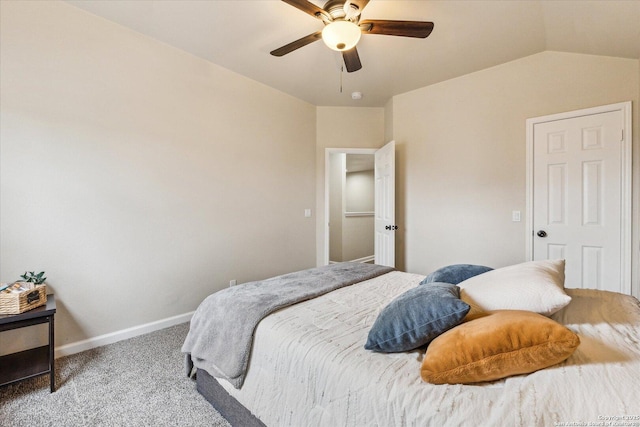 carpeted bedroom featuring ceiling fan and lofted ceiling