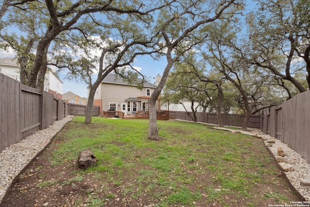 view of yard featuring a deck