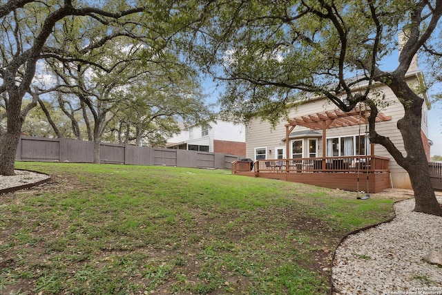 view of yard with a pergola and a wooden deck