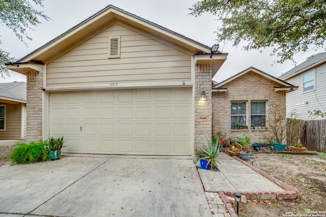 view of front of property featuring a garage