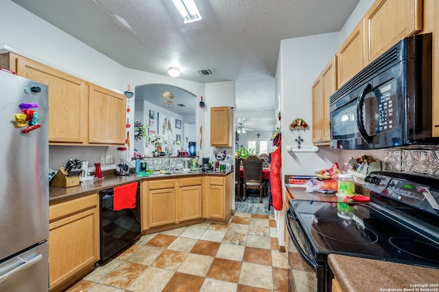 kitchen featuring black appliances, sink, ceiling fan, a textured ceiling, and light brown cabinetry