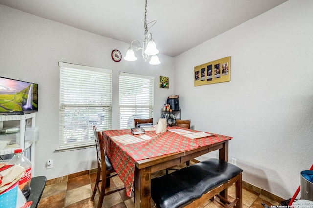 dining room featuring a chandelier