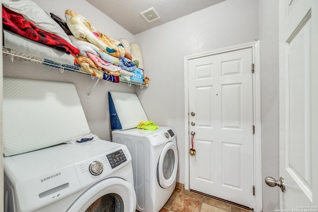 laundry area featuring separate washer and dryer