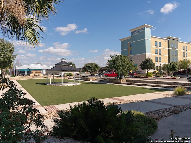 view of community featuring a gazebo and a yard