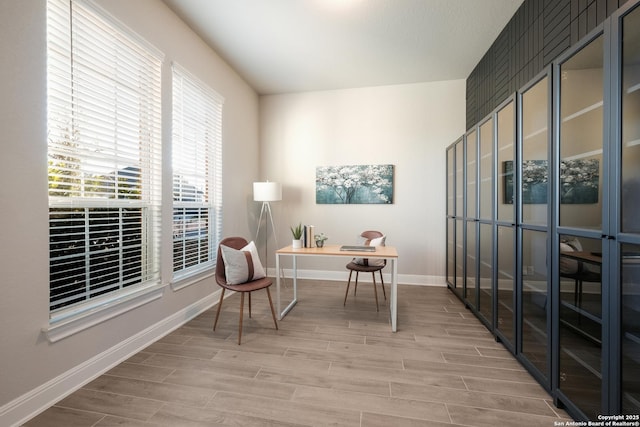 office area with hardwood / wood-style floors