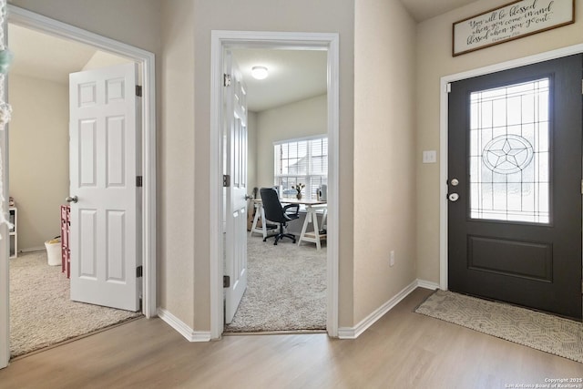 entrance foyer featuring light wood-type flooring