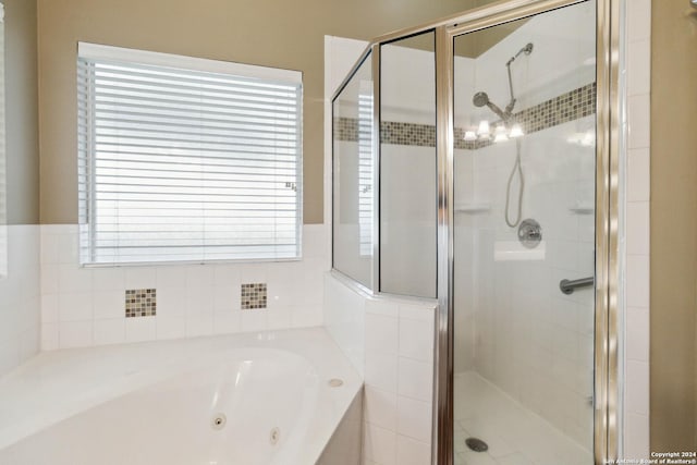 bathroom with independent shower and bath