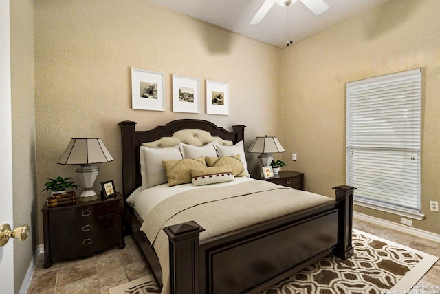 bedroom featuring vaulted ceiling and ceiling fan