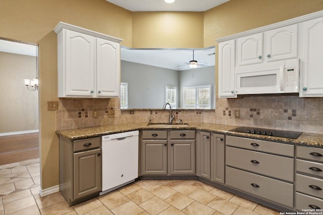 kitchen featuring white cabinets, gray cabinets, white appliances, and sink