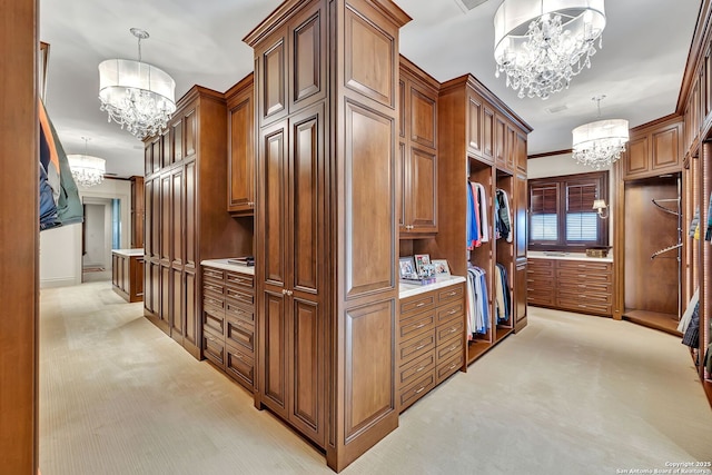 spacious closet featuring light colored carpet and a notable chandelier