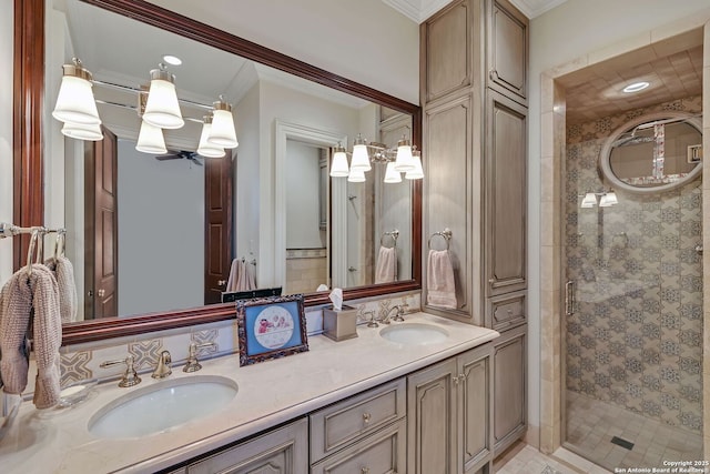 full bathroom with crown molding, a sink, and a shower stall