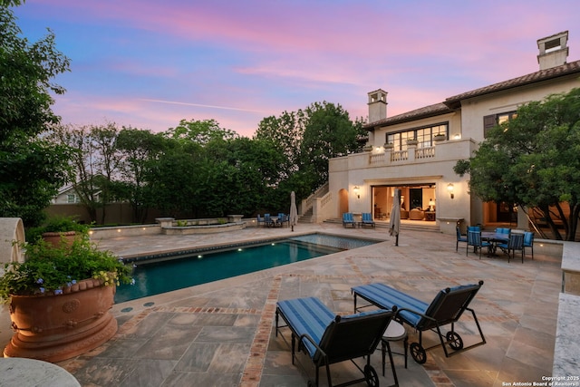 200 Geneseo Rd, Terrell Hills, TX 78209 - pool at dusk with stairway and a patio area