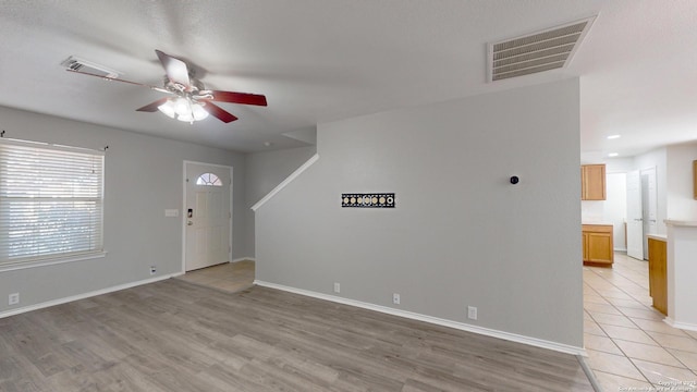 interior space featuring ceiling fan and light hardwood / wood-style floors