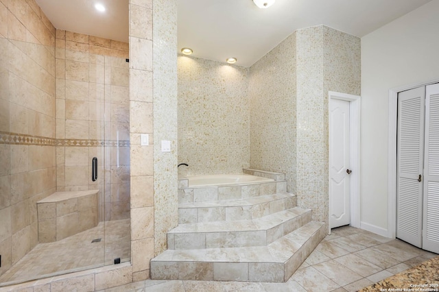 bathroom featuring plus walk in shower