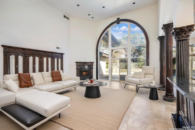 living room with a high ceiling