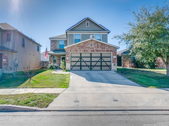 view of front of home featuring a garage and a front lawn