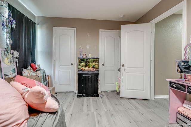 bedroom featuring light hardwood / wood-style flooring