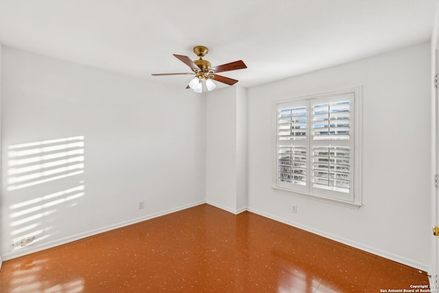 empty room featuring ceiling fan