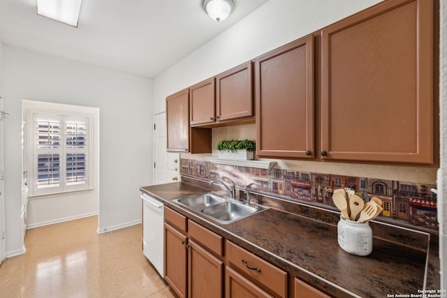 kitchen with sink and white dishwasher