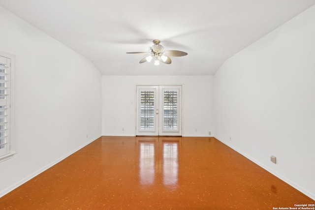 spare room featuring french doors and ceiling fan