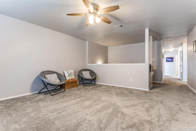 unfurnished room with ceiling fan and carpet floors