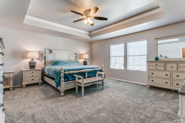 bedroom featuring carpet flooring, a raised ceiling, ceiling fan, and ornamental molding