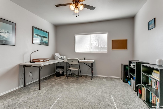 carpeted office with ceiling fan