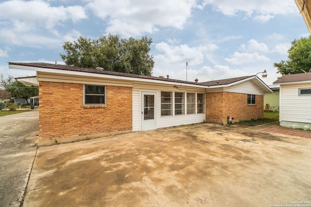 back of house featuring a patio area