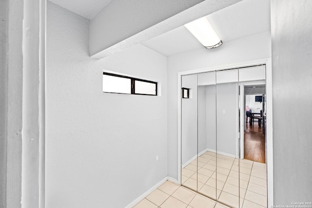 bathroom with tile patterned floors