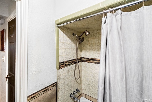 bathroom featuring shower / bathtub combination with curtain