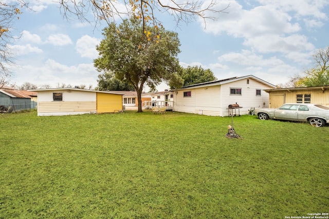 view of yard with a deck