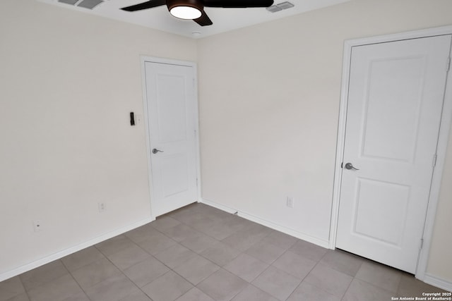 empty room featuring ceiling fan