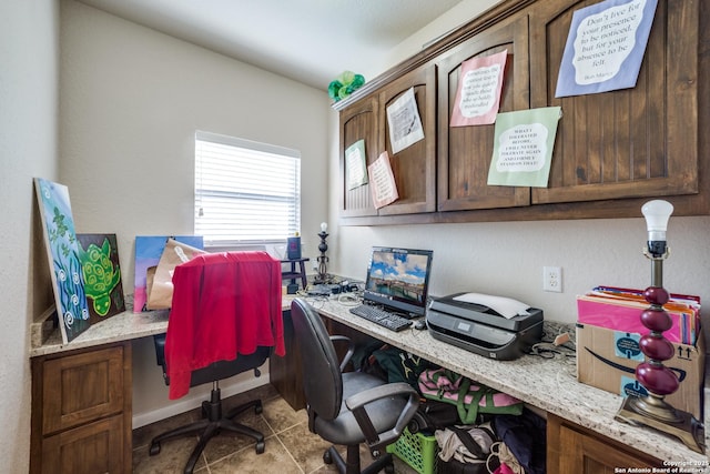 tiled office space with built in desk