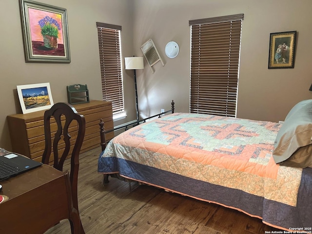 bedroom featuring wood-type flooring