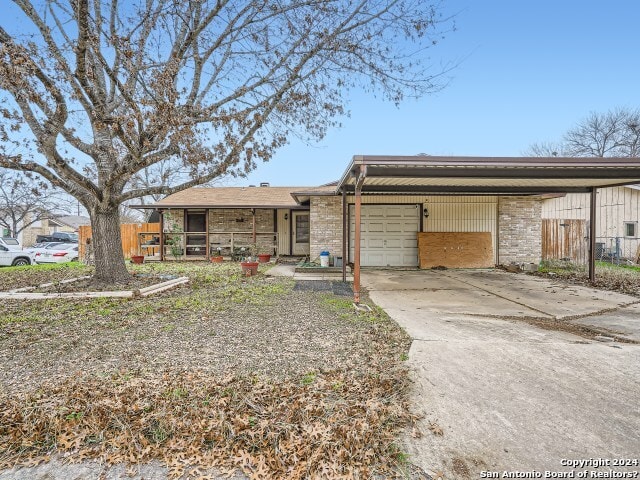 single story home featuring a garage