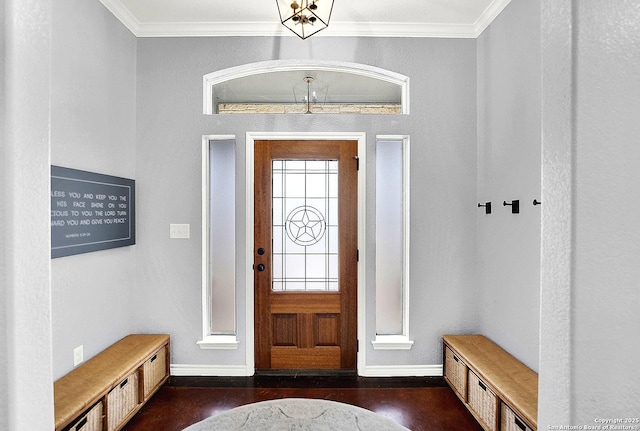 foyer entrance featuring ornamental molding