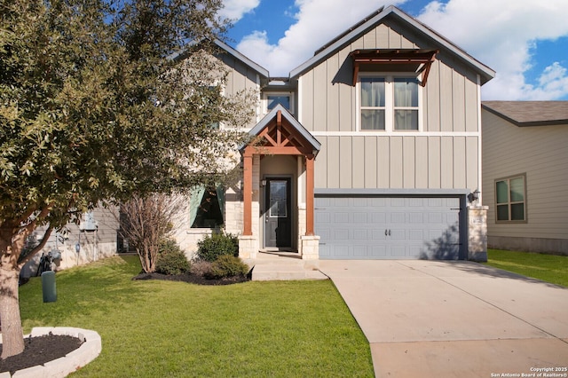 view of front of home with a garage and a front lawn