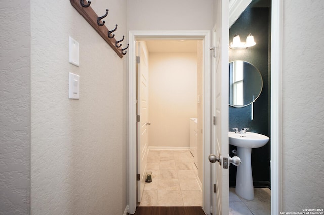 bathroom featuring tile patterned floors and sink