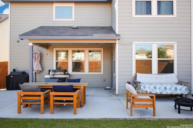 rear view of property with a patio area