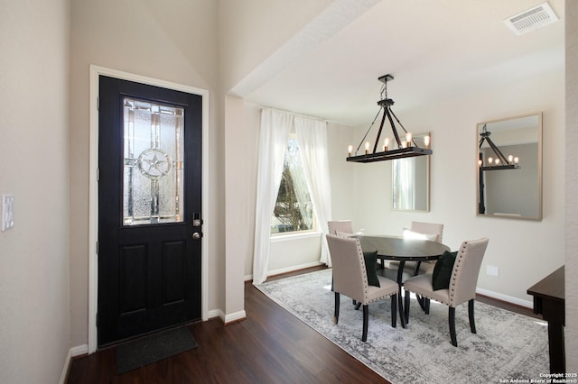 foyer entrance with dark wood-type flooring