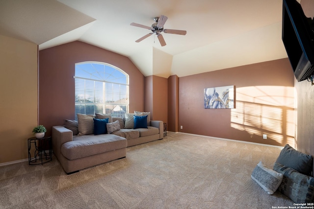 living room with carpet flooring, ceiling fan, and vaulted ceiling