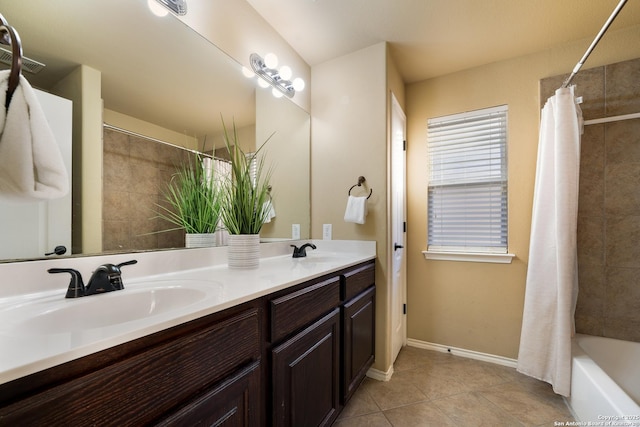 bathroom with shower / bath combo, vanity, and tile patterned floors