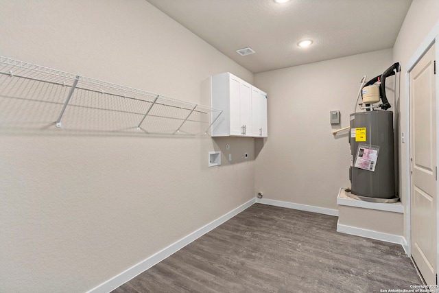 laundry area featuring cabinets, washer hookup, electric dryer hookup, water heater, and hardwood / wood-style floors